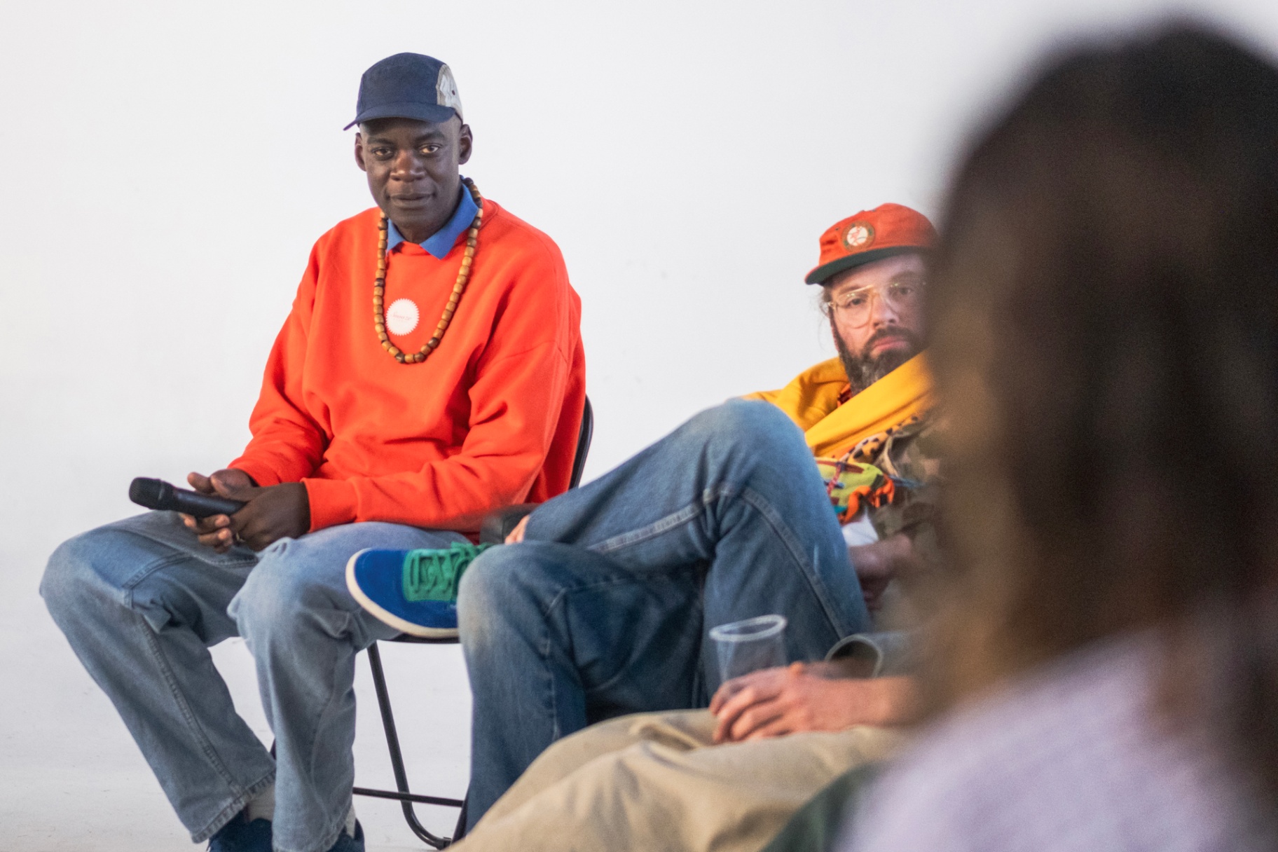 Two panellists seated during the Creative Resistance session.